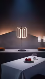 a table topped with a glass of wine and a lit candle