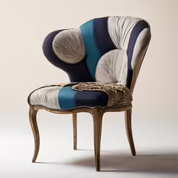 the back of an upholstered chair, with white and blue accents