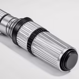 a close up shot of a telescope on the table