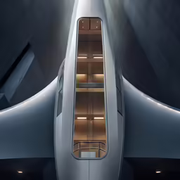 a photo taken from below shows a building staircase