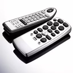 two remote controls are arranged together and on display