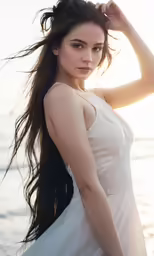 a beautiful young woman wearing a white dress