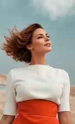 an image of woman with her hair in the air