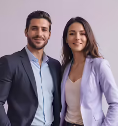 a woman is posing with a man