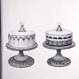 two decorative cakes and one that is cut open
