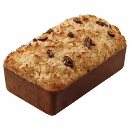 a chocolate - covered bread cake sits on a cardboard container