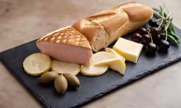 a close - up of the sandwich with fruit and cheese