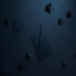 black object scattered around on a dark surface