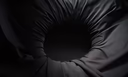 an object is shown with no head and a black background