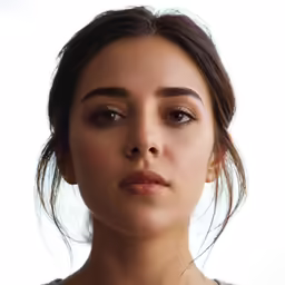 an up close shot of a woman with a ring on her nose