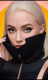 a blonde woman wearing a black top, her eyes are blue