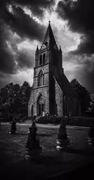 an old church in the midst of some dark clouds