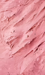 a photo of red sand that is textured