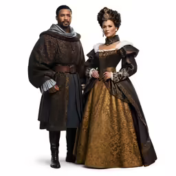 man and woman in medieval costumes for christmas