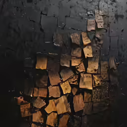 pieces of wood cut into cubes arranged together on a dark surface