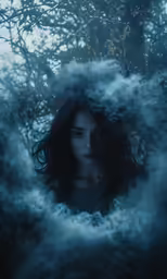 a girl peeking from the branches of a tree with mist in front of her