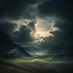 a grassy field surrounded by mountains and cloudy skies