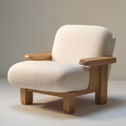 a white chair with a wooden frame and footrests