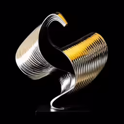 an artistic gold and silver sculpture on display
