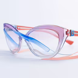 the frame of the glasses is made of plastic and features a blue strip