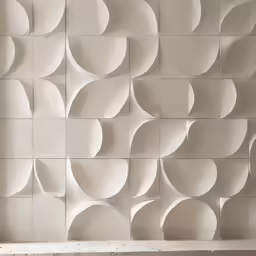 some shapes with shadows in front of it