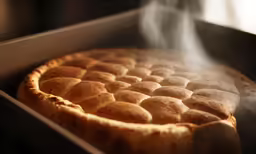 food is being cooked on a cooking tray