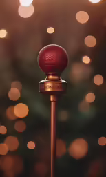 a close up shot of a brown colored microphone