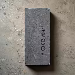 a small block of concrete is placed on a floor