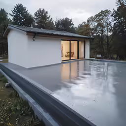 a house with a sliding glass door that is closed