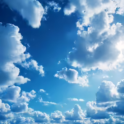 a cloudy blue sky with white clouds