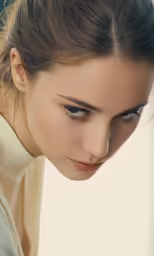 a young woman with eye lashes is staring at something