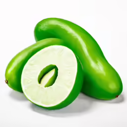 three green fruits cut in half with one section filled with kiwi