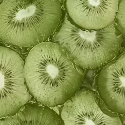 slices of kiwi sit together in a pile