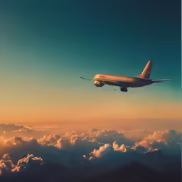 airplane flying over clouds in a bright sky