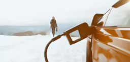 a woman in brown outfit standing next to a red car in snow