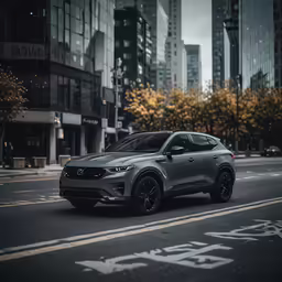 a gray car parked on the side of a street next to tall buildings