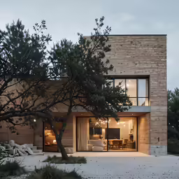 large modern house with outdoor living area visible