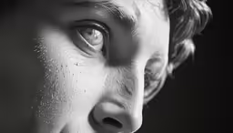 the person with the freckle is making a weird face
