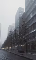 a street with a row of tall buildings covered in lights