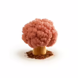 a pink tree made out of some kind of powder