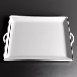 the white dish is resting on the black table