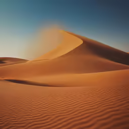 an empty desert with sand dunes and a very long exposure of the sun