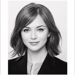 a black and white photo of a woman with shoulder length hair