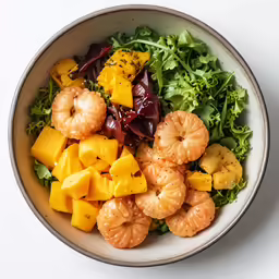 large bowl filled with various vegetables and fruits