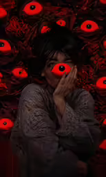 an image of a woman that is surrounded by red flowers