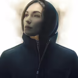 there is a woman in the hoodie standing up