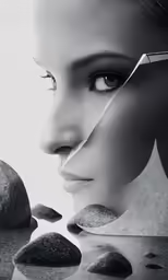 a woman with scissors is putting a rock on her face