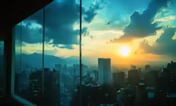 a beautiful sunset is visible out of an apartment window