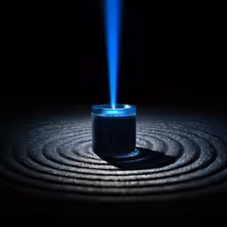 a blue substance being blown by a blue lighter