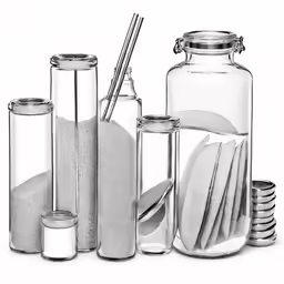 several different kinds of jars and glasses